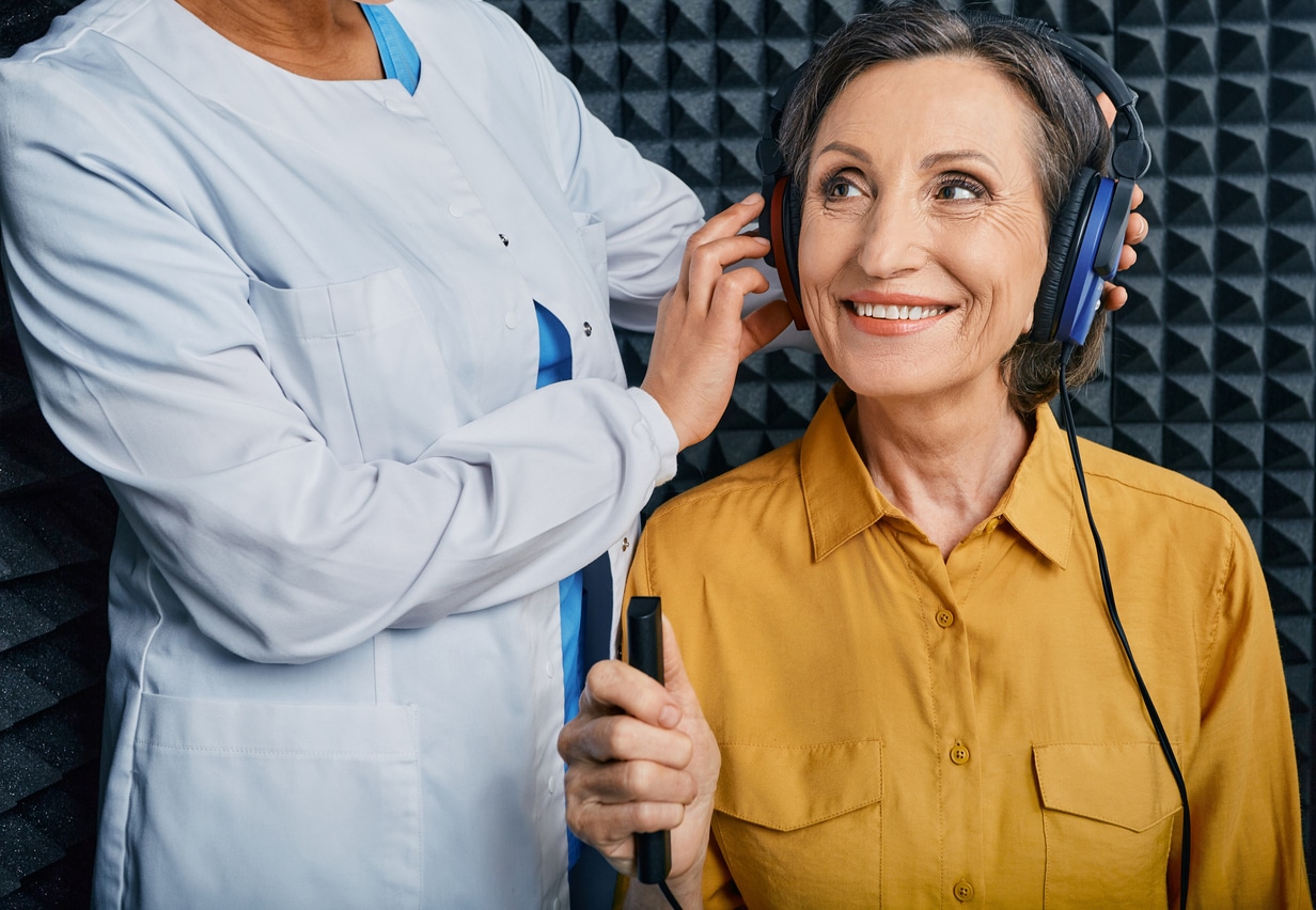 audiology patient completing hearing test